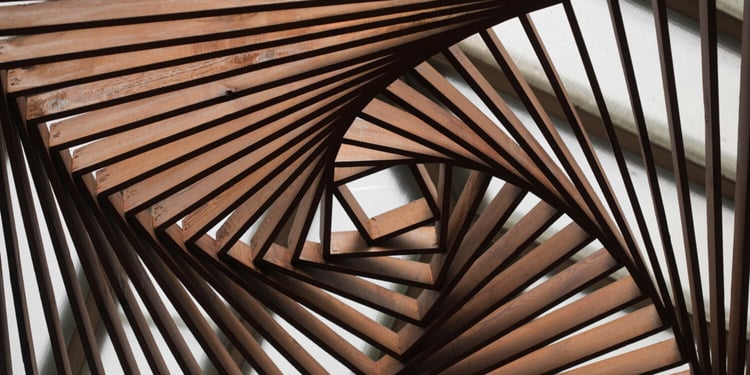 a spiral staircase made out of wooden slats